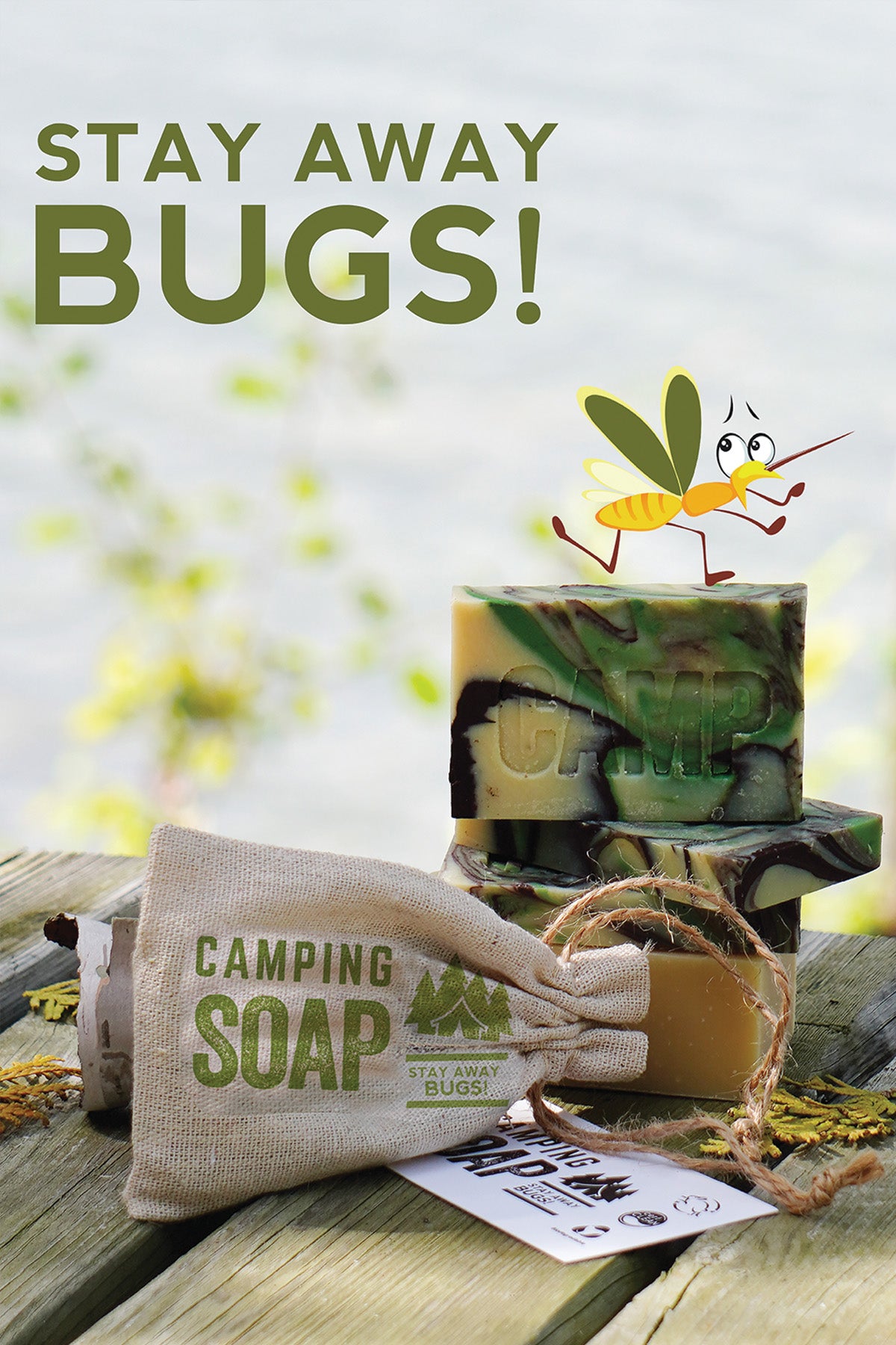 Camping soap with a drawstring bag and a cartoon mosquito on a wooden surface.