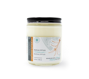 Candle with a label on a white background