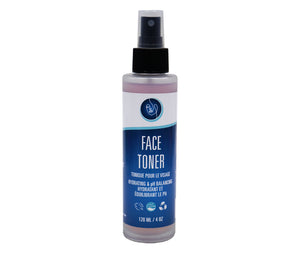 Face toner bottle with blue label on a white background Pure Heart Essentials