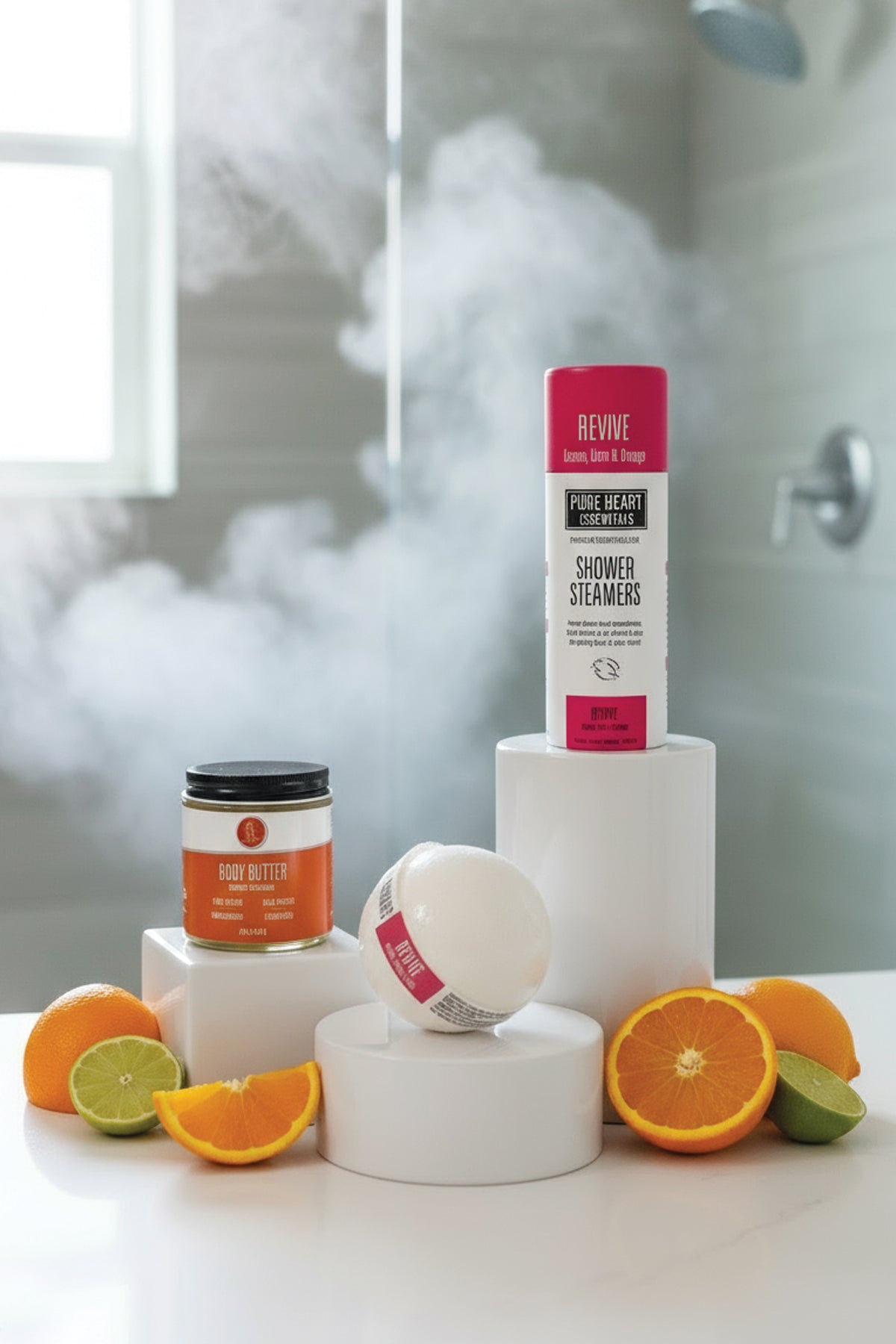 PURE HEART ESSENTIALS products with orange slices and a lime on a white surface