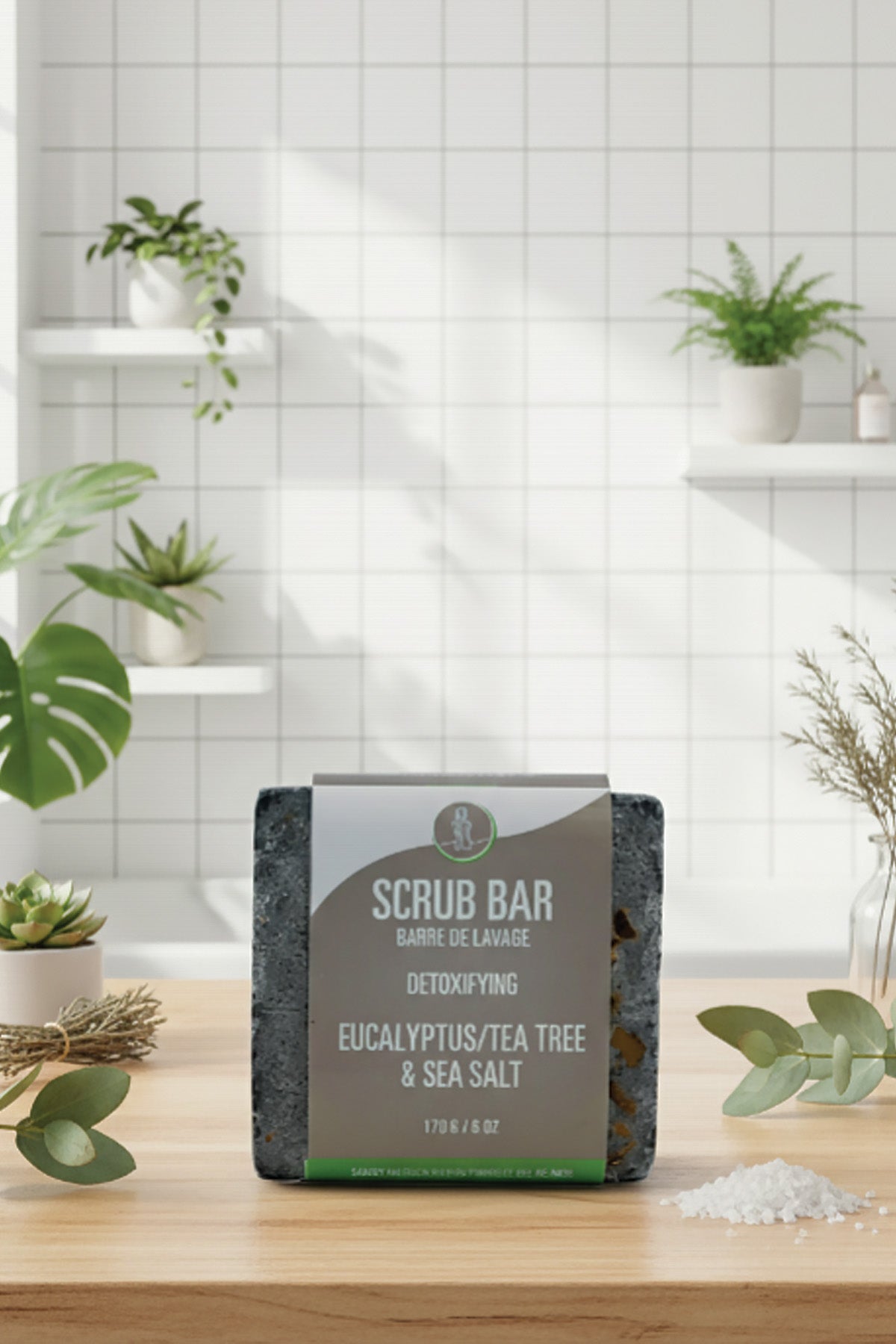 Scrub bar packaging on a wooden surface with plants in the background