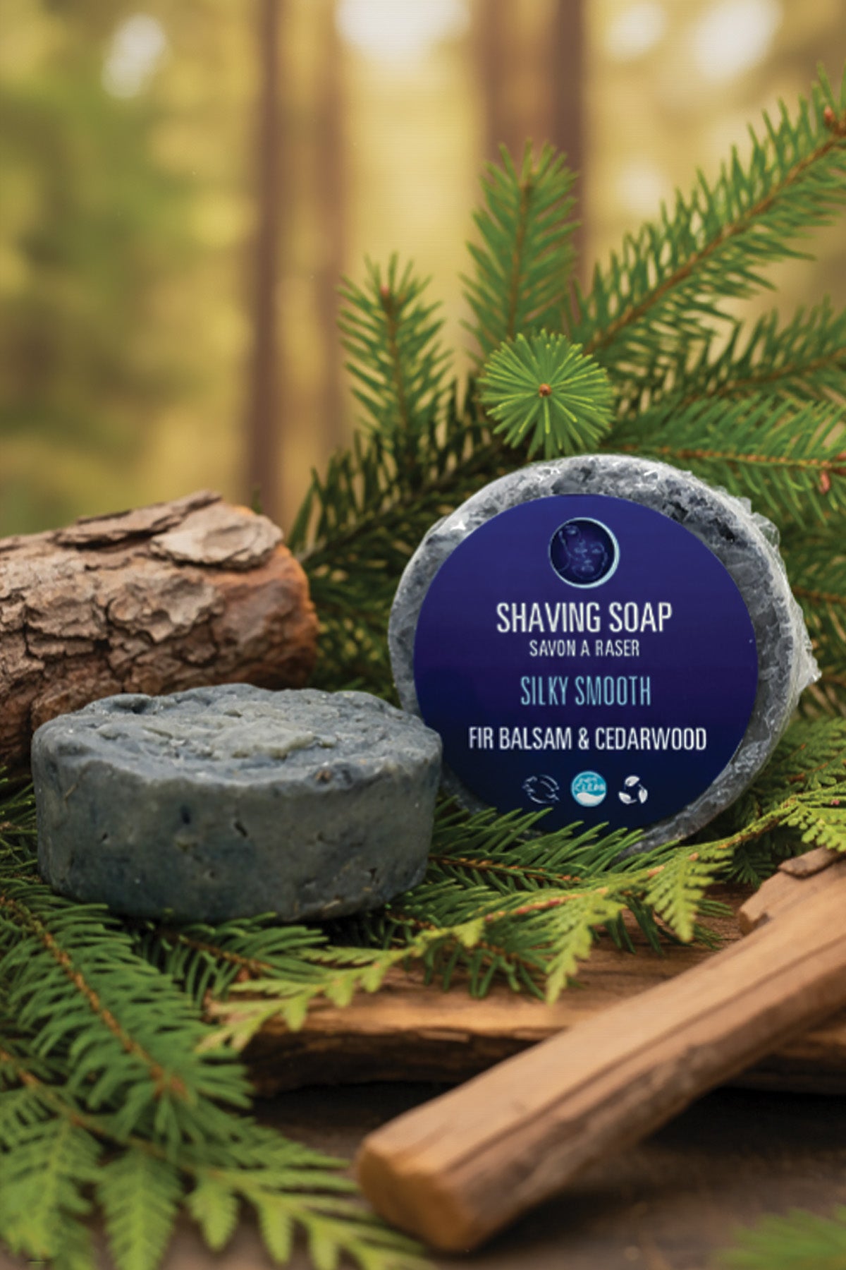 Shaving soap bar with a blue label on green foliage