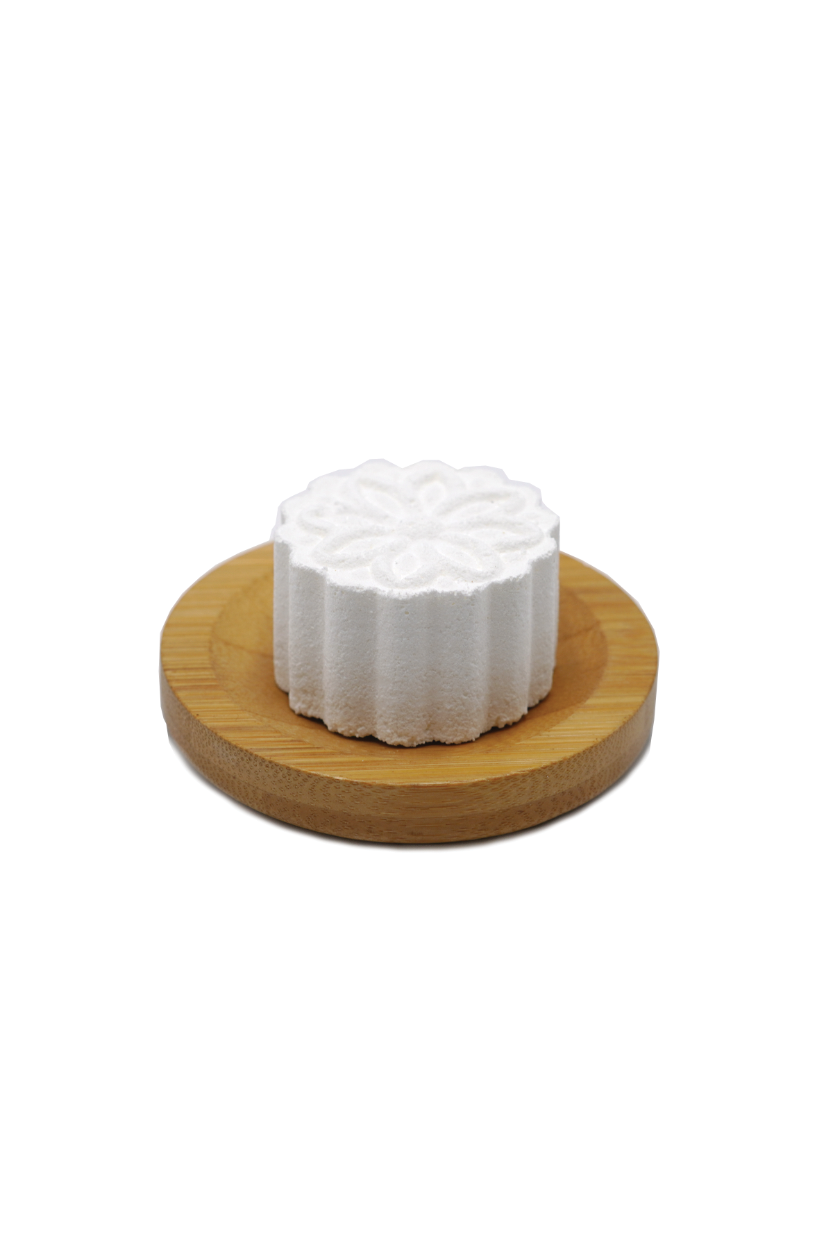 a shower steamer on a bamboo dish, Pure Heart Essentials