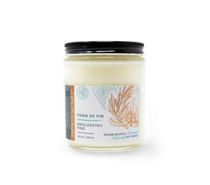 Candle jar with a label on a white background