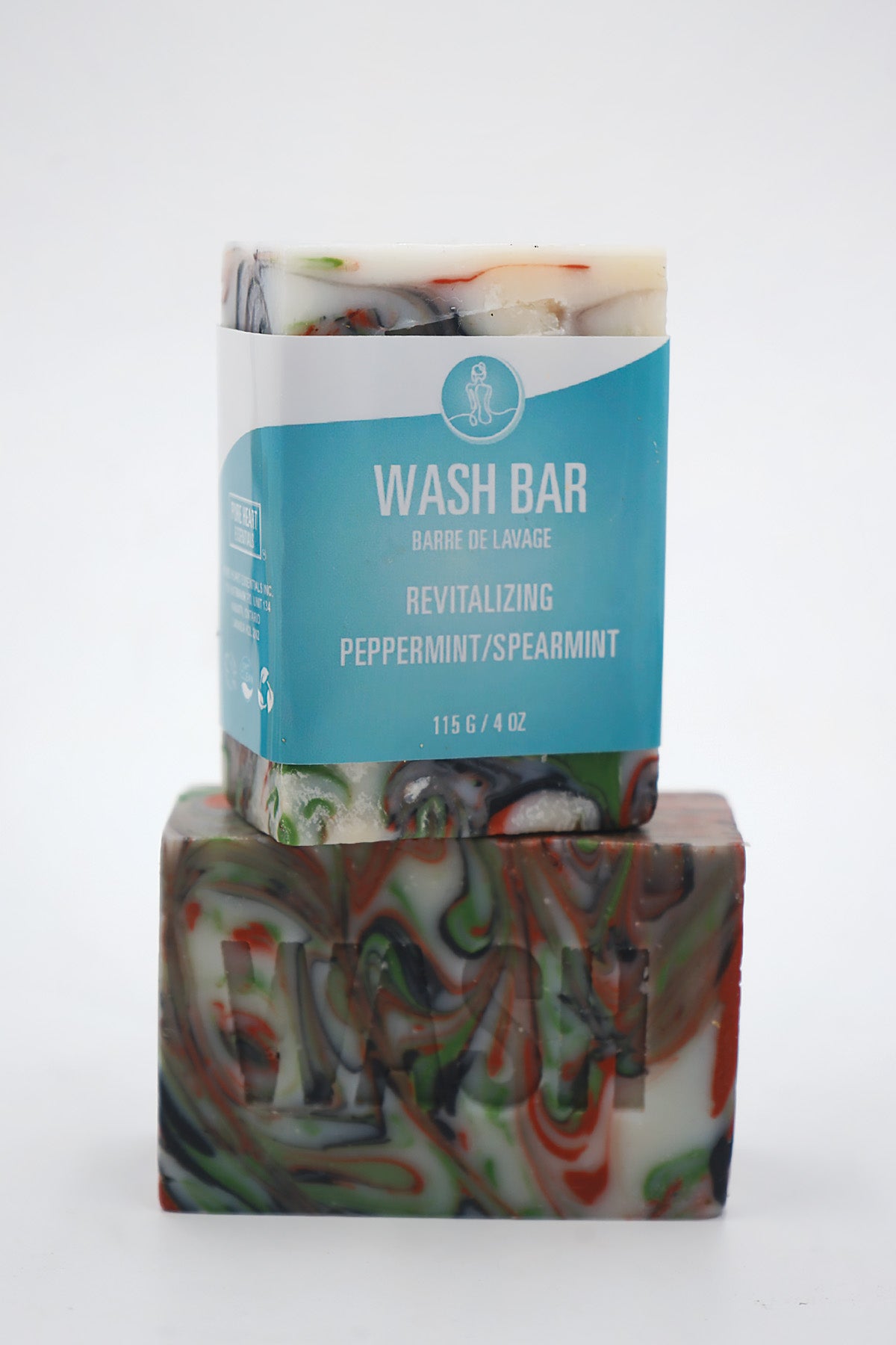 Colorful soap bar with a labeled packaging on a white background