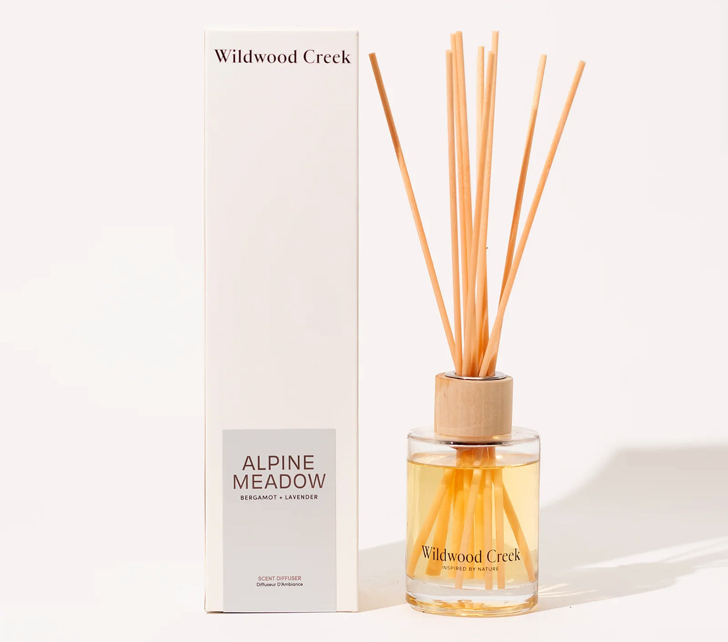 Wildwood Creek Alpine Meadow diffuser with packaging on a white background