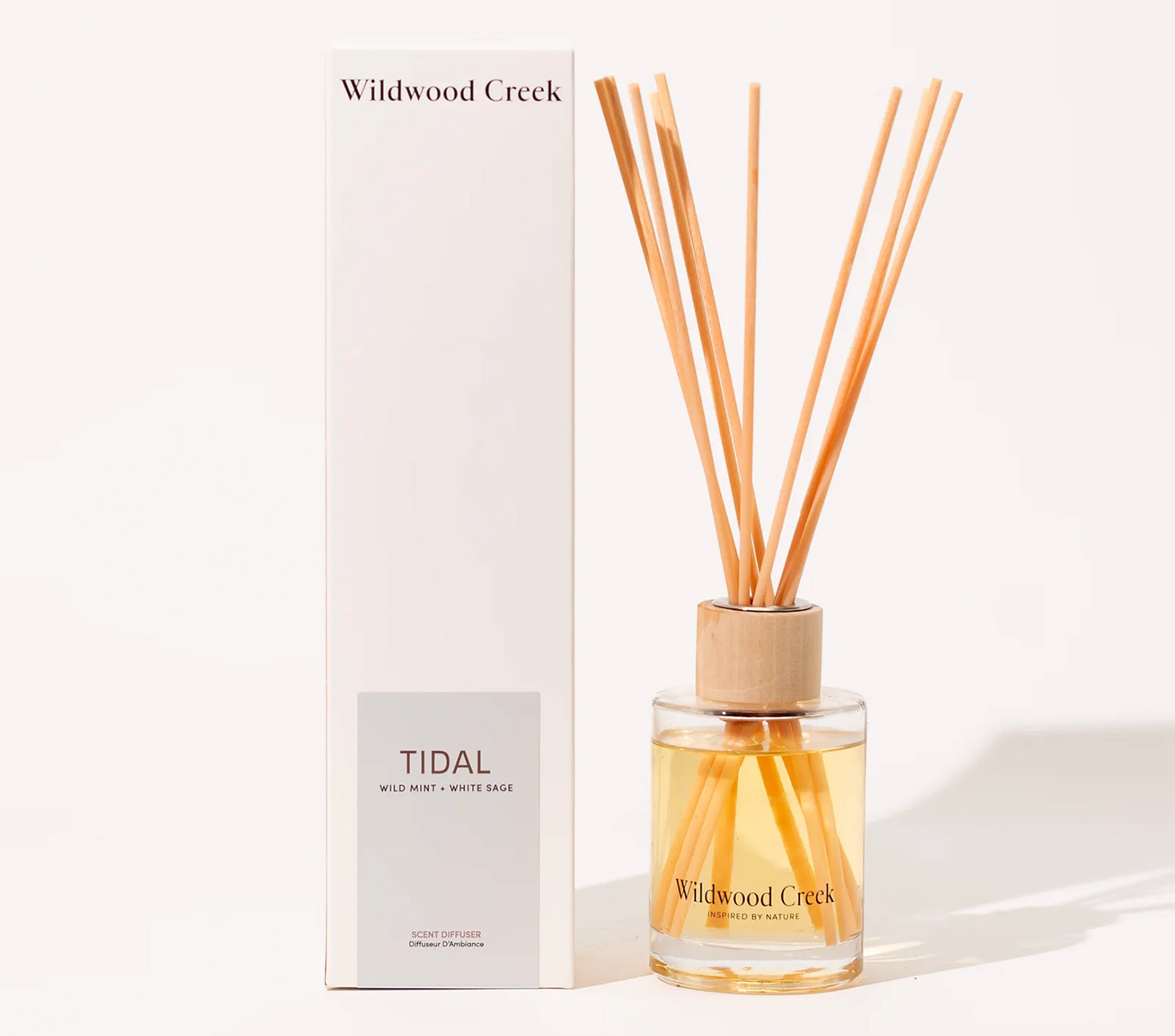 Wildwood Creek diffuser with reeds and packaging on a white background