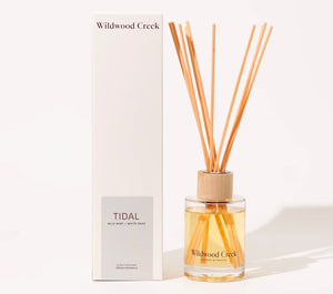 Wildwood Creek diffuser with reeds and packaging on a white background